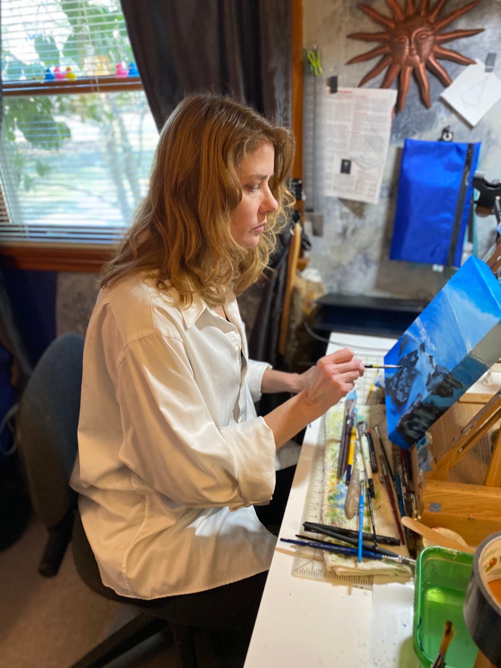 assorted albums on brown wooden rack